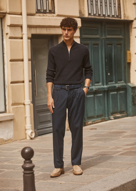 FULL BODY EDITORIAL IMAGE OF MODEL WEARING STARK SWEATER AND MARCELLUS PANT