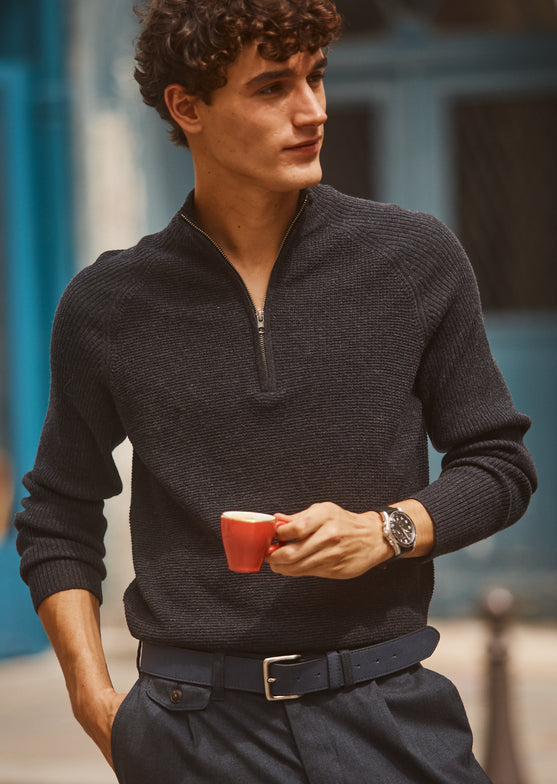 FRONT EDITORIAL IMAGE OF MODEL WEARING STARK SWEATER AND MARCELLUS PANT
