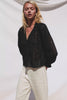 Francine Top in Cotton With Boxy FIt Front Buttons Split V-Neck Band Collar Semi-Sheer Embroidered Grid Floral Cutwork and Long Puff Sleeves With Fitted Cuffs - Full Body Front View Featured on Model - Video