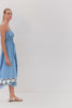 (Video): Murano sleeveless dress in French Blue, shown on a model to showcase the lightweight, flowing fabric.