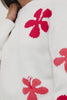 Zoey Crewneck Sweater in Cotton Blend With Floral Motifs, Dropped Shoulders, and Long Sleeves in Kauai Colorway - Video - Upper Body Front View Featured on Model