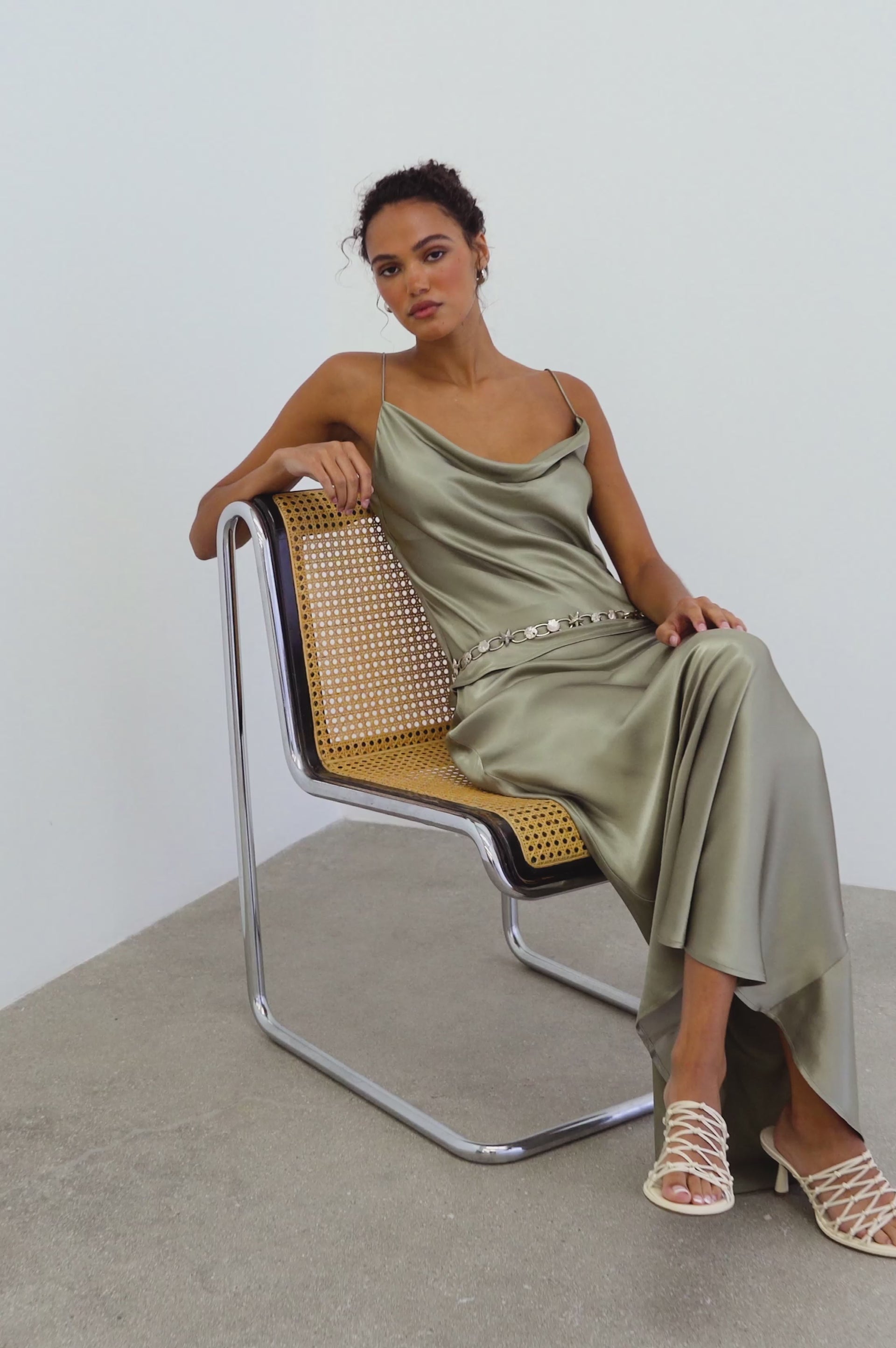 Model wearing the Taysia Top in Mermaid, a camisole silhouette with drape scoop neck