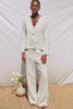 Fleur Top in Linen With Floral Eyelet Embroidery Open Front Adjustable Front Self-Ties Long Sleeves and Loose Fit in White - Full Body Front View Featured on Model - Video