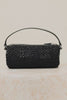Como Mini Barrel Bag in Woven Raffia With Top Strap, Removable and Adjustable Crossbody Strap, and Top Zip in Black Raffia Colorway - Video - Rotating View Featured.