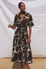 Richmond Midi Dress in Cotton With Collar Front Button Placket Side Pockets D-Ring Waist Belt Short Sleeves and Relaxed Fit in Terra Colorway - Full Body Front View Featured on Model - Video