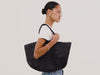 Brava Tote in Woven Leather With Top Handles and Spacious Interior in Black Colorway - Video - Upper Body View Featured on Model