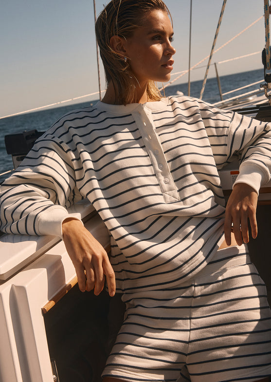 Front editorial image of model wearing Joan Sweatshirt and Jane Short