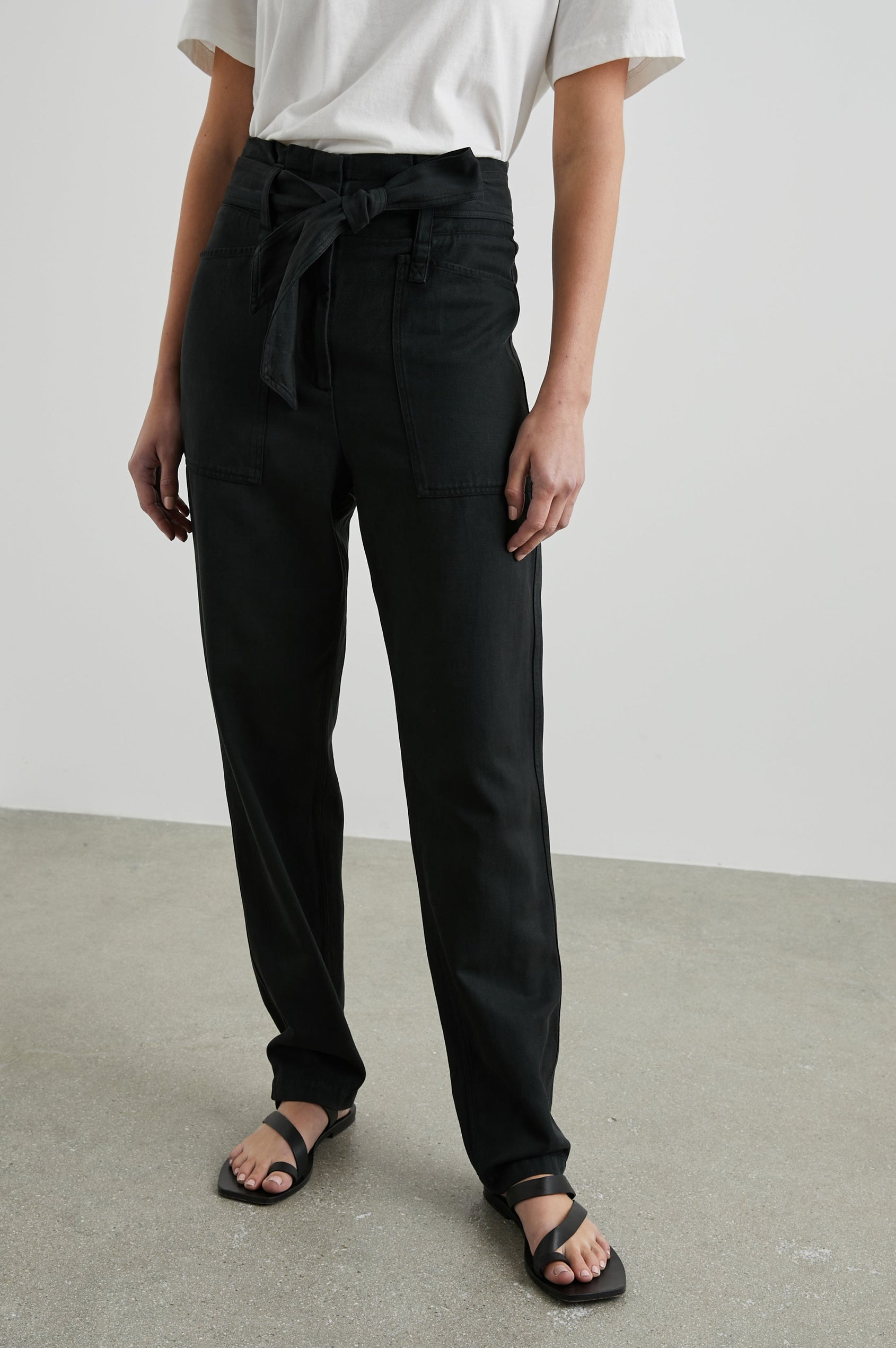 Achilles Pants with Fabric Tie Belt, Two Large Front Pockets, Two Back Patch Pockets and Belt Loops in Washed Black Colorway - Front View Featured on Model 
