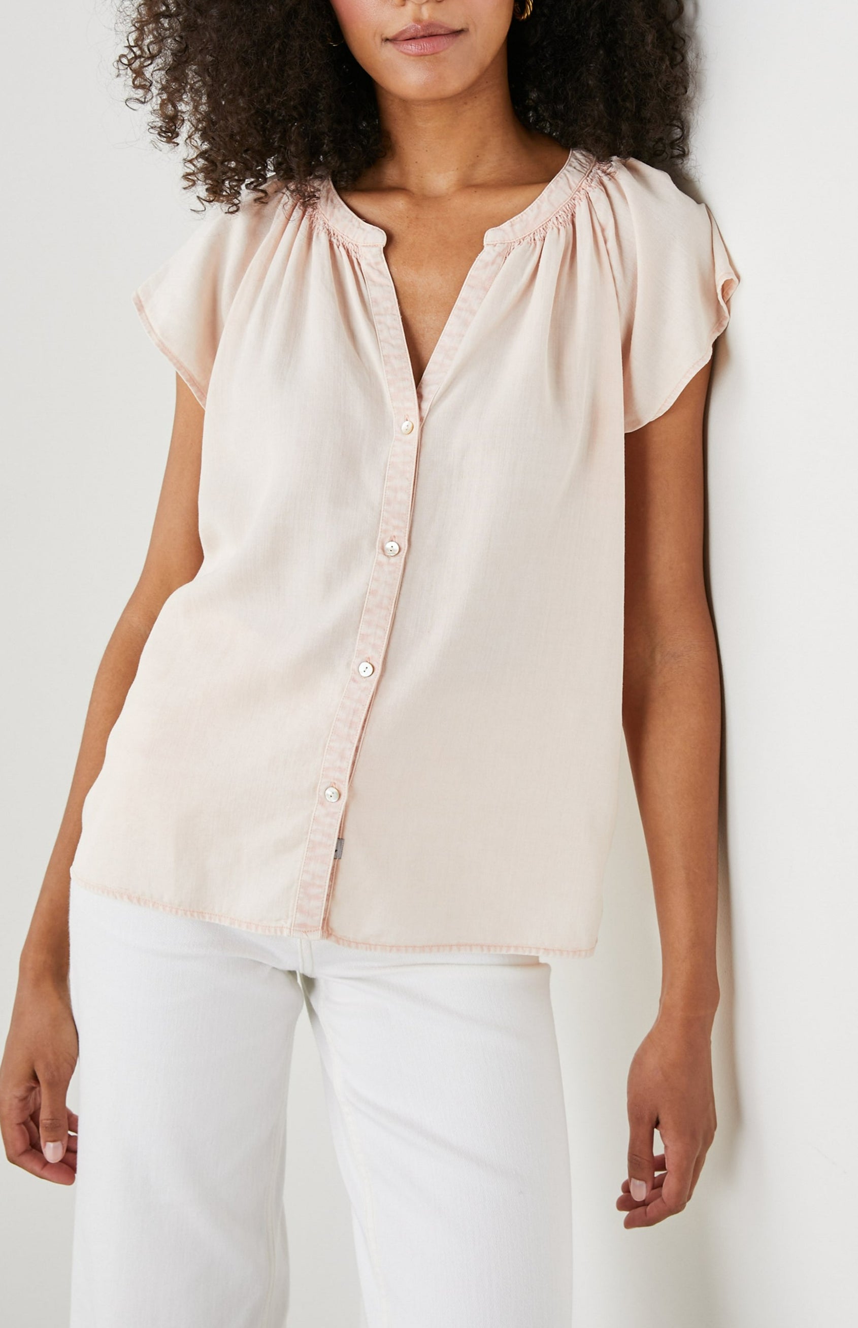 Alena Short Sleeve Top with Flutter Sleeves, a V Neck, Buttons Down the Bodice and Ruching along the Collar in Petal Colorway - Front View Featured on Model