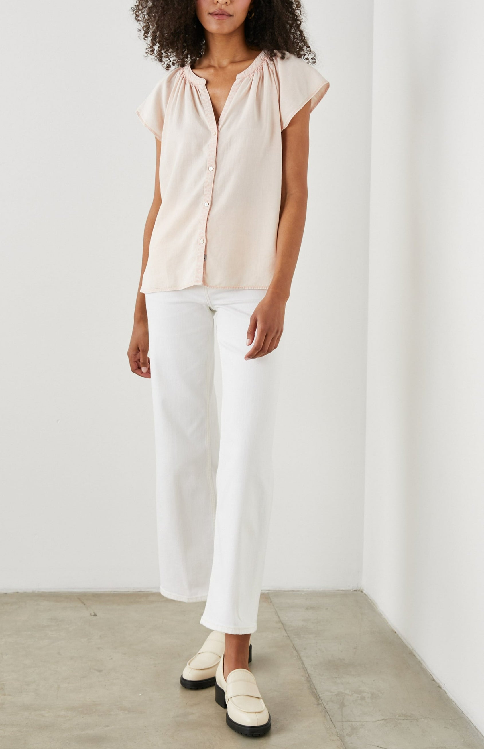 Alena Short Sleeve Top with Flutter Sleeves, a V Neck, Buttons Down the Bodice and Ruching along the Collar in Petal Colorway - Front Full Body View Featured on Model