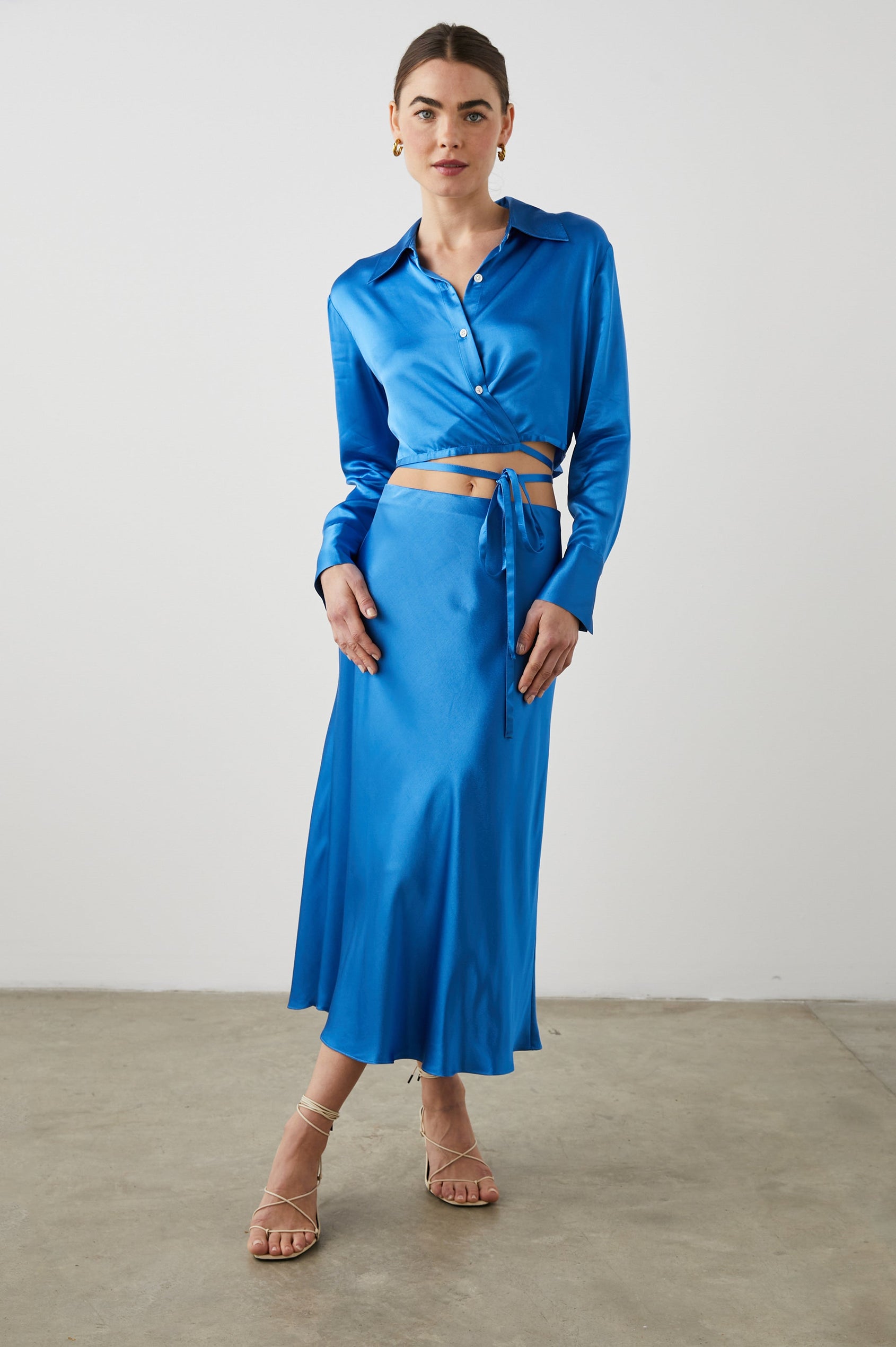 Anya High-waisted Midi Skirt in Cobalt Colorway - Front Full Body View Featured on Model