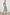 AUDRINA DRESS EMERALD BLOOM - MODEL 2 FRONT FULL BODY HANDS ON HIPS
