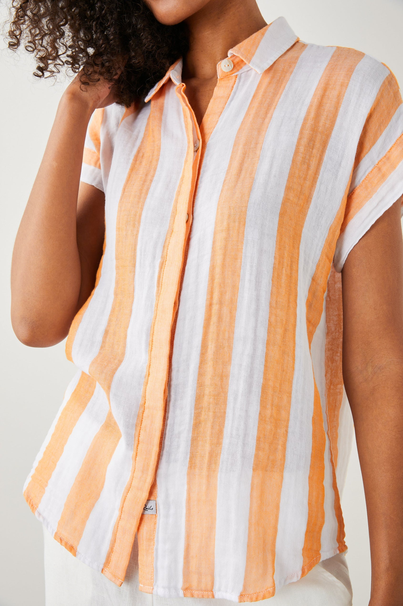Jamie Short Sleeve Button Up in Ortona Stripe Colorway, Orange and White Vertical Stripes - Front View Featured on Model 
