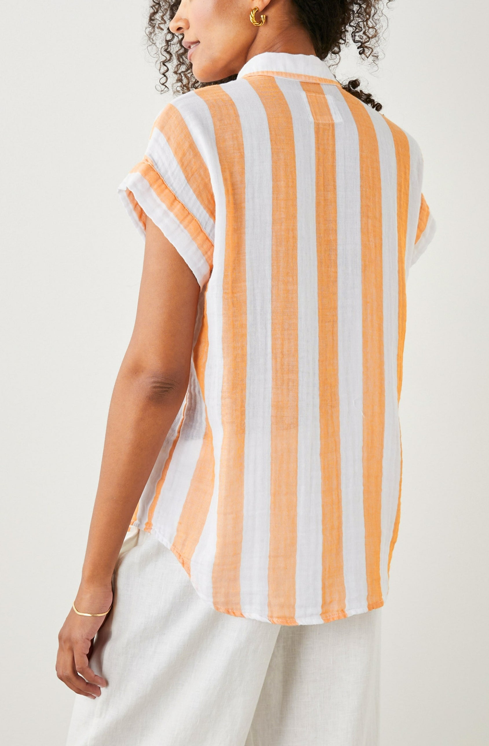Jamie Short Sleeve Button Up in Ortona Stripe Colorway, Orange and White Vertical Stripes - Back View Featured on Model 
