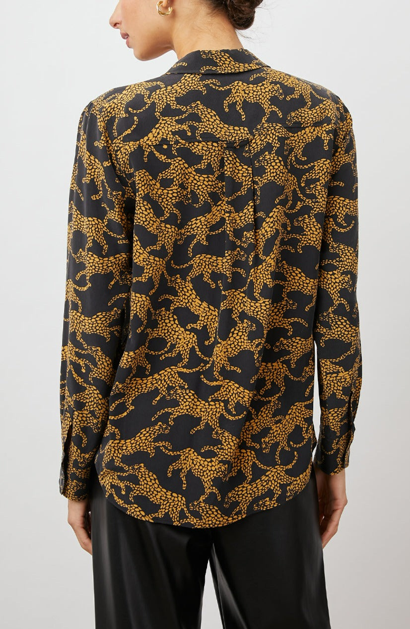 Kate Long Sleeve Button up with a Chest Patch Pocket in Lynx Colorway, Brown Lynx on Black  - Back View Featured on Model