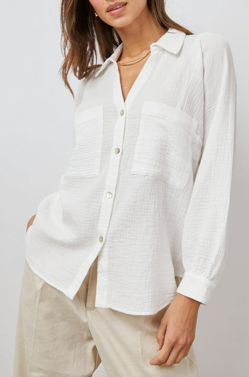 Lauren Long-Sleeve Button Up with Two Chest Patch Pockets and a V Neck in White Colorway - Front View Featured on Model