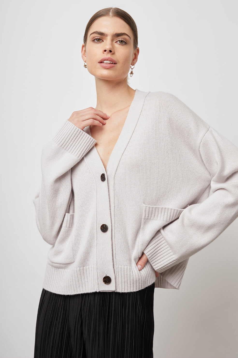 LINDI STONE CARDIGAN-FRONT IN MOTION