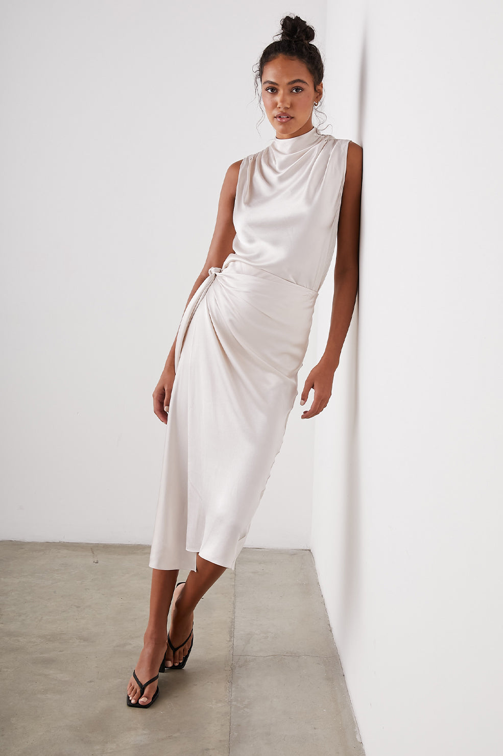 PAIGE SKIRT IVORY - FULL FRONT BODY IN MOTION