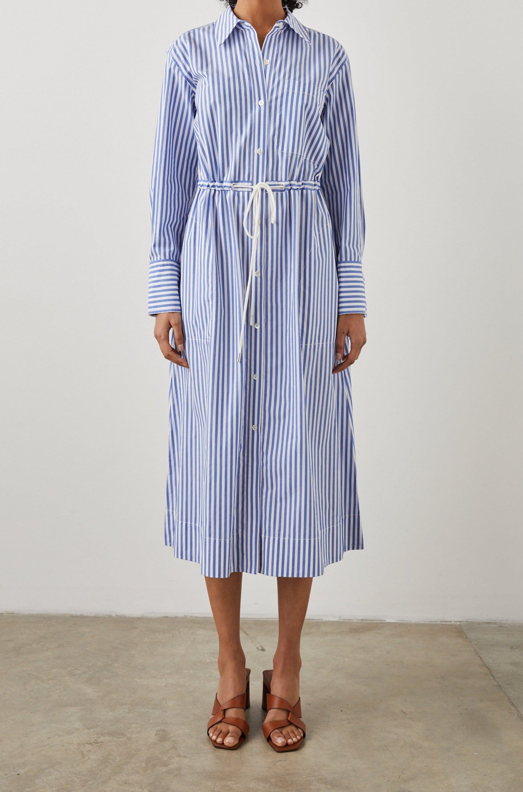 Shivonne Long-Sleeve Midi Dress with a Full Button Front, a Collar and a Drawcord Waist in Rivera Stripe Colorway, Blue and White Vertical Stripes - Front Full Body View Featured on Model