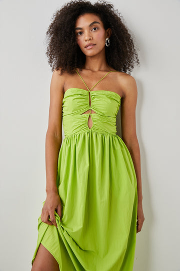 Silvia Sleeveless Maxi Dress with Spaghetti Straps with a Lower Back Tie, an Open Back, and Cutouts Along the Center of the Bodice in Banana Leaf Colorway - Front Full Body View Featured on Model