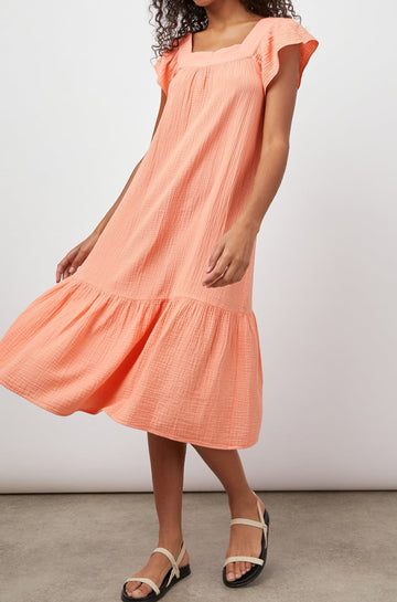 SKYLAR PEACH AMBER DRESS-FRONT IN MOTION