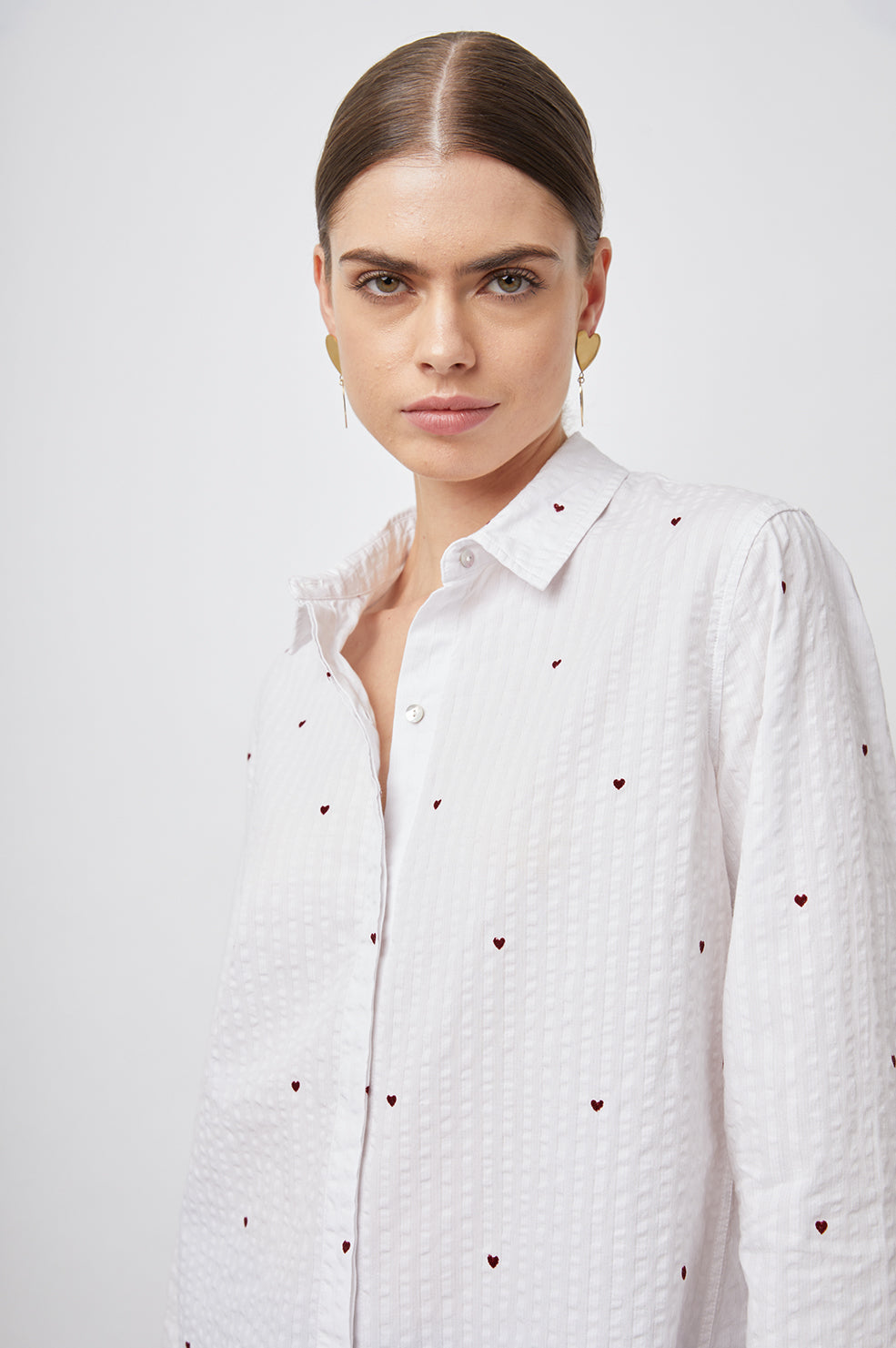 Taylor Long-Sleeve Button Up with Small Red Hearts in Hearts Colorway, White with Alternating Textured Stripes - Front View Featured on Model