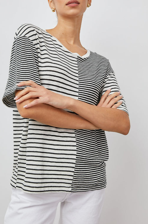 THE SPLIT TEE WHITE BLACK MIXED STRIPES SHORT SLEEVE TEE- FRONT CROSSED ARMS