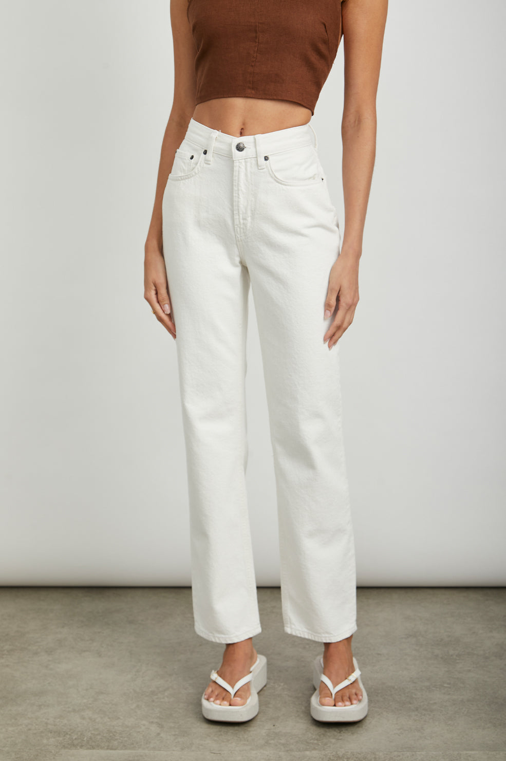 Topanga Straight Jeans with a Hole at the Knee and Fraying, Belt Loops, Two Front Pockets plus a Coin Pocket and Two Back Patch Pockets in Salt White Distress Colorway - Front View Featured on Model